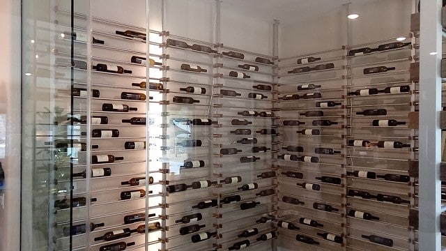 Wine Cellar with Sleek Metal Wine Racks and an Efficient Wine Cooling System Riverside County